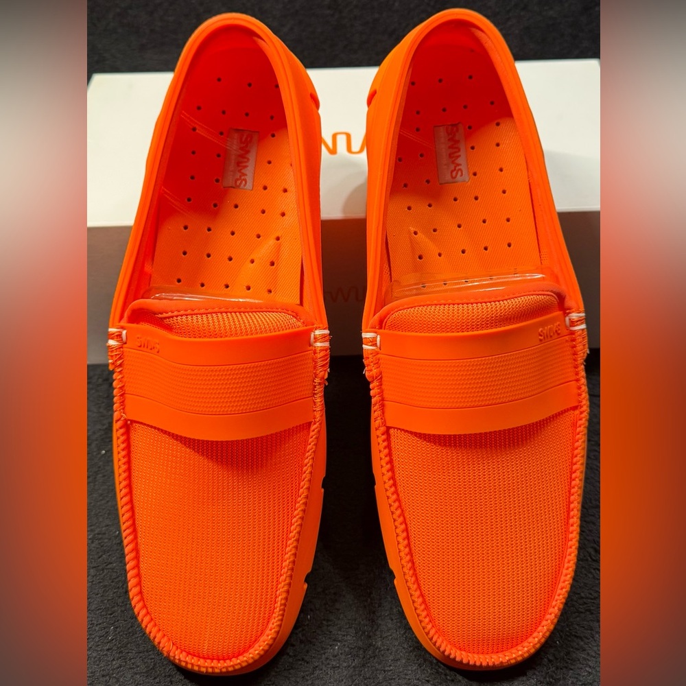 Swims “single stride band” orange slip on shoes. New in box.